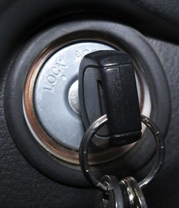 car keys in ignition, engine is on.